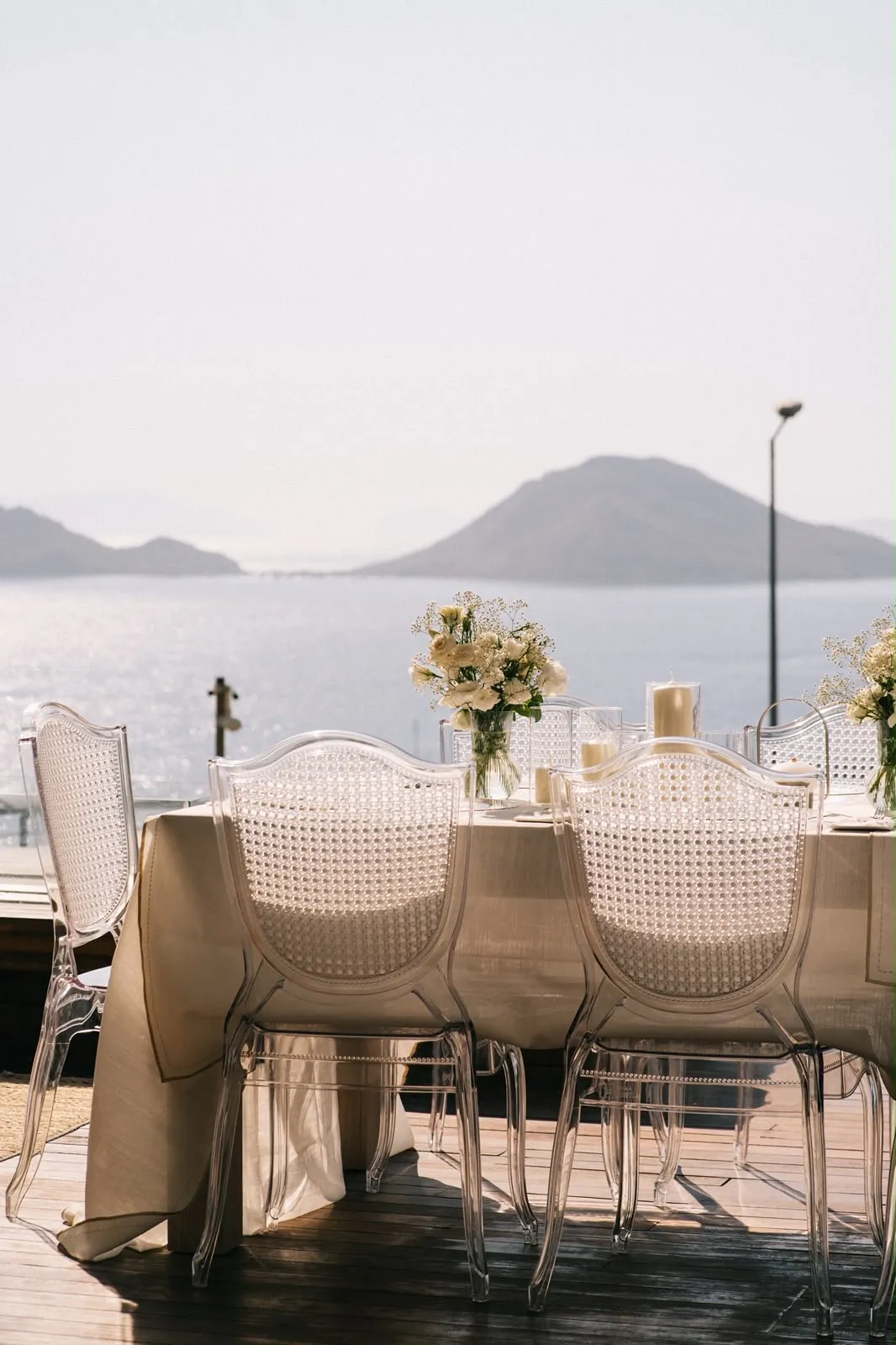 Wedding dinner table with white flowers overlooking the Aegean in Bodrum